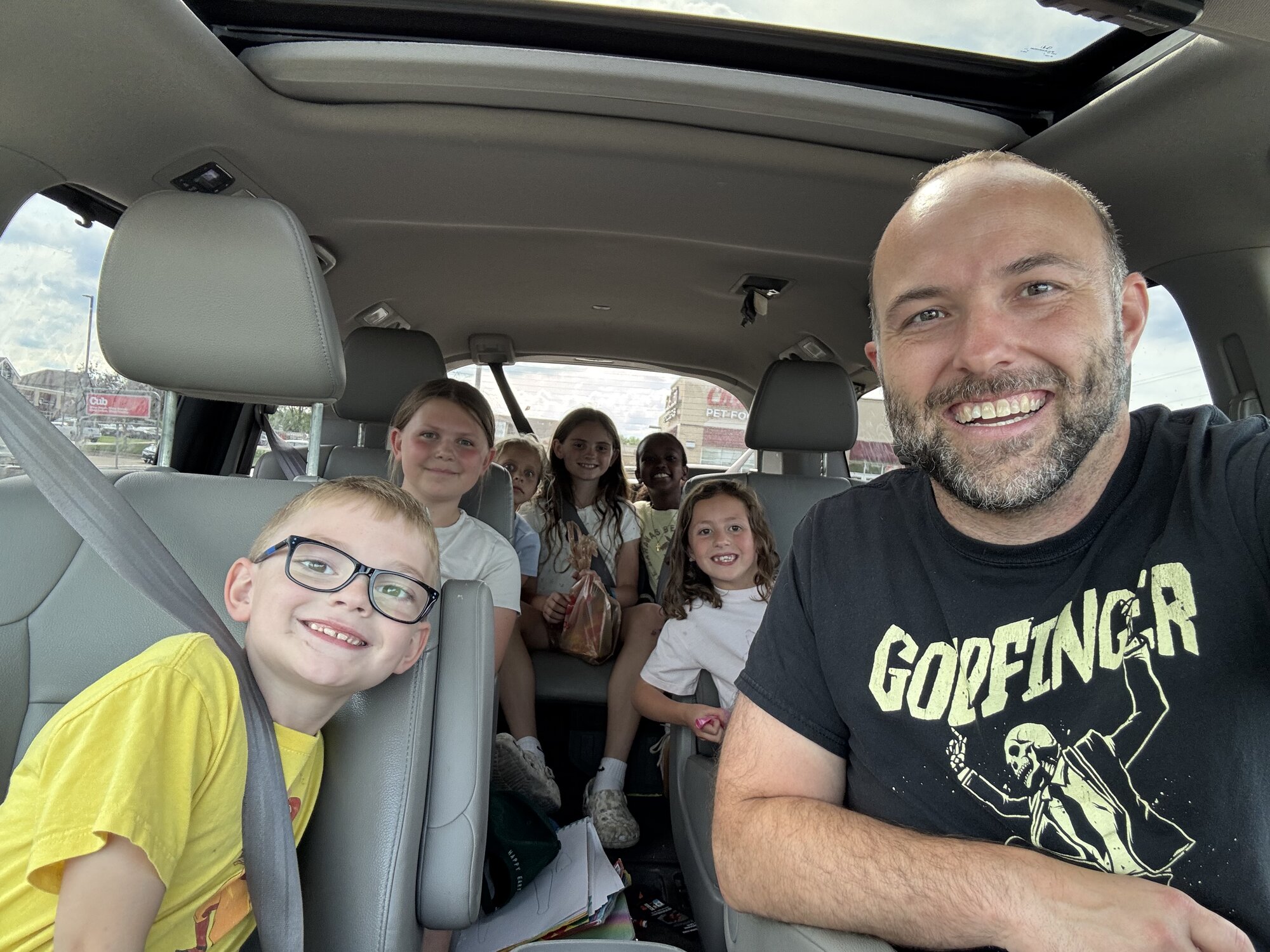me taking the kids up to cub for supplies for 'candy salad' (don't ask)