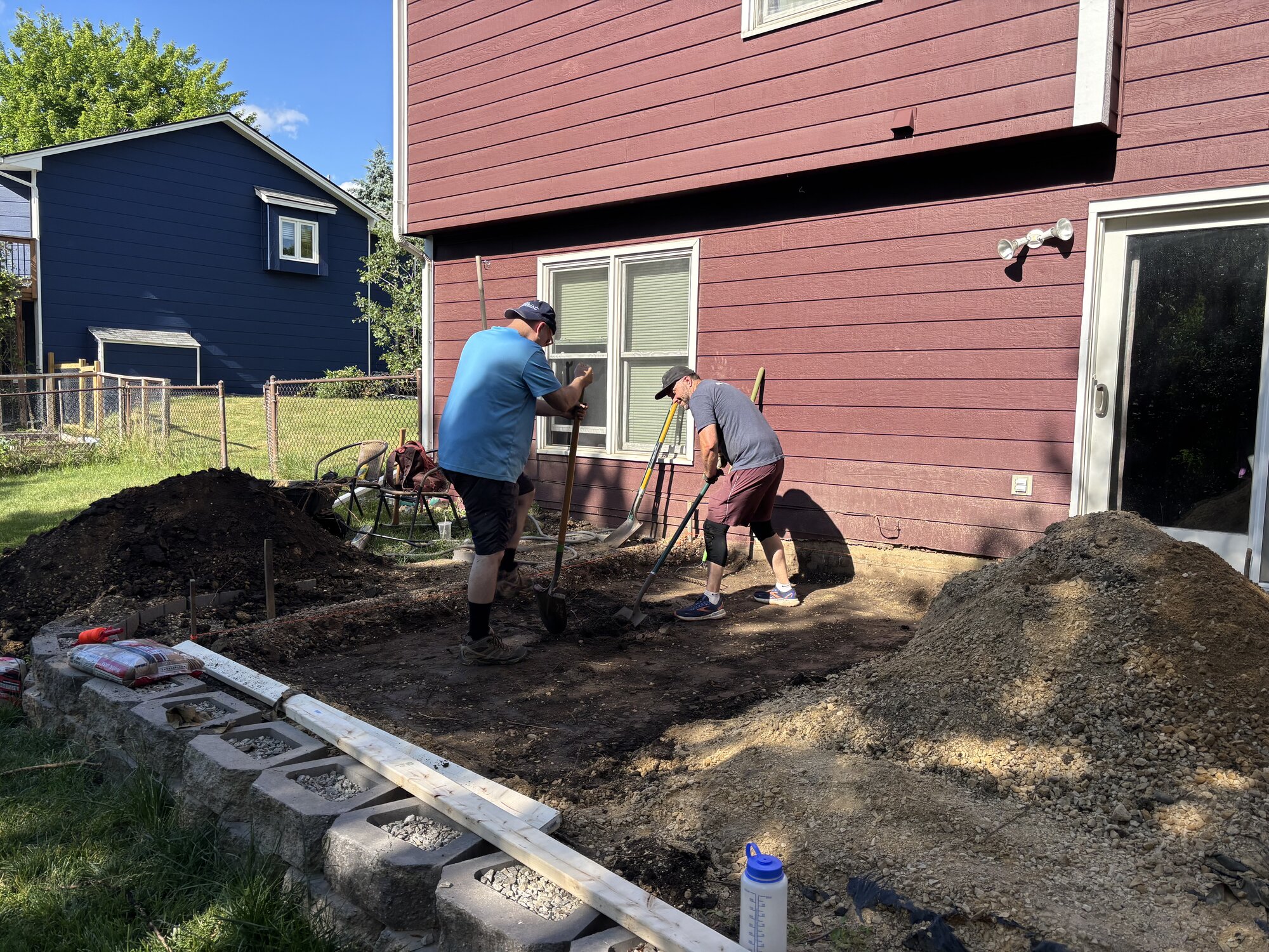 me and my brother shoveling dirt