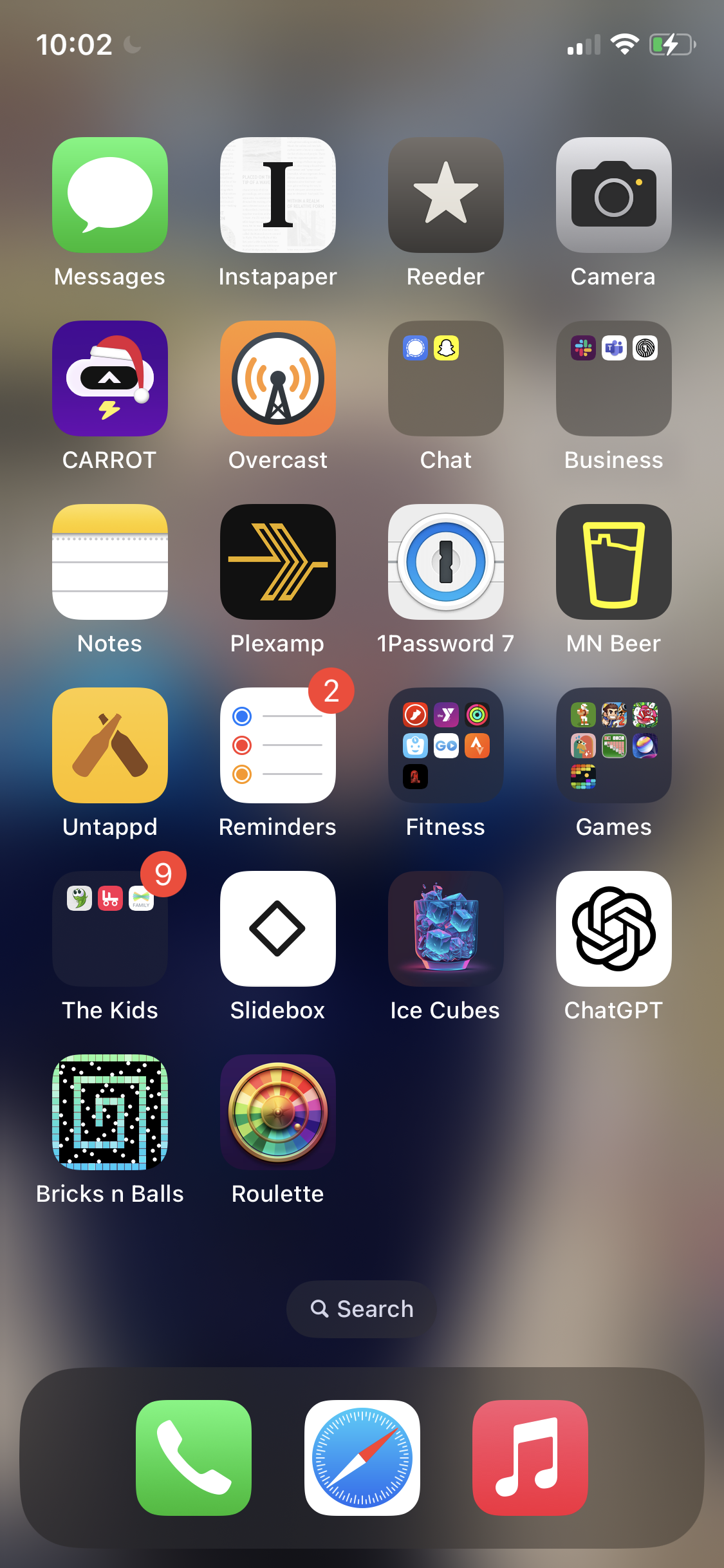 An iPhone home screen with tons of apps on it