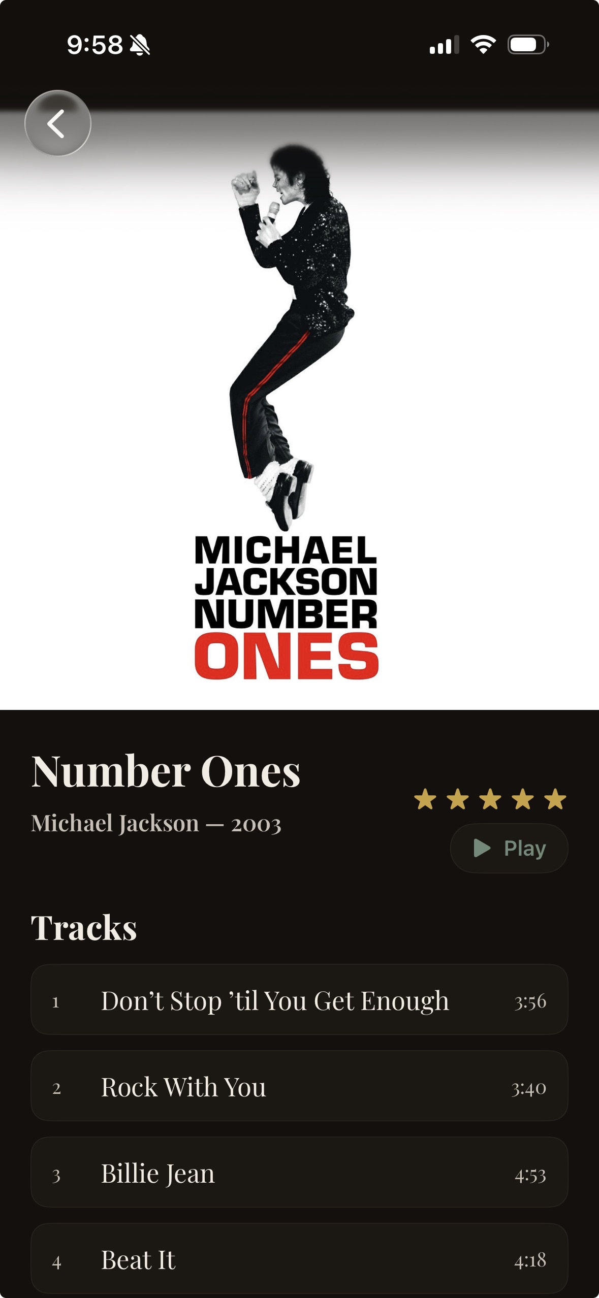 Music app album screen showing Michael Jackson “Number Ones” cover art with track list including Don’t Stop ’til You Get Enough, Rock With You, Billie Jean, and Beat It